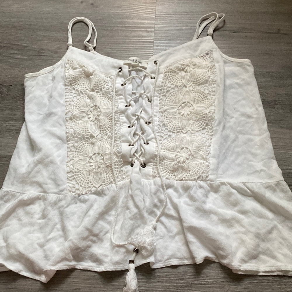 White tank top with crisscross down middle